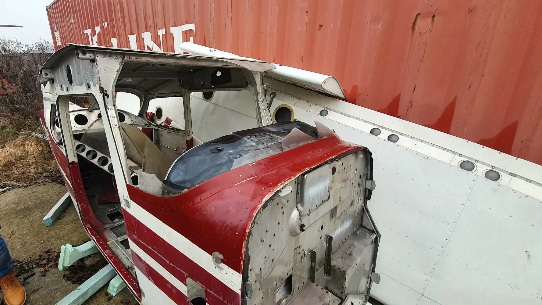 A C-172 scrapped airplane cockpit in a scrapyard