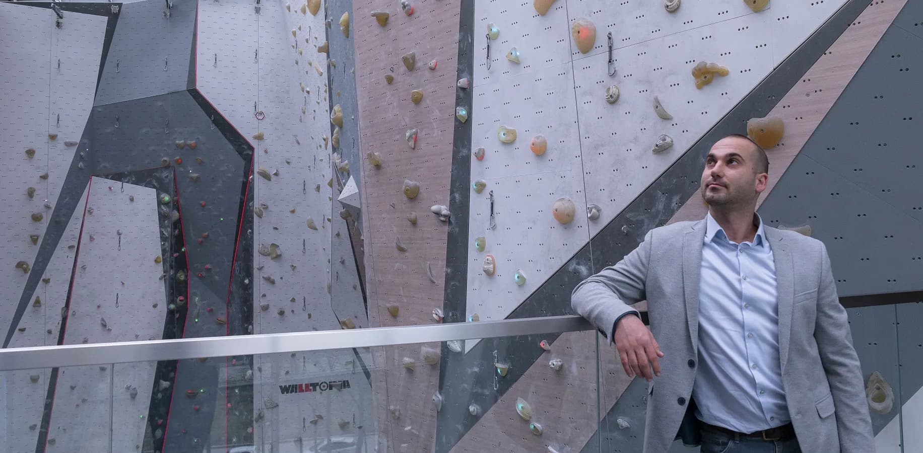 Dian Deskov in Walltopia climbing gym with E-Walls